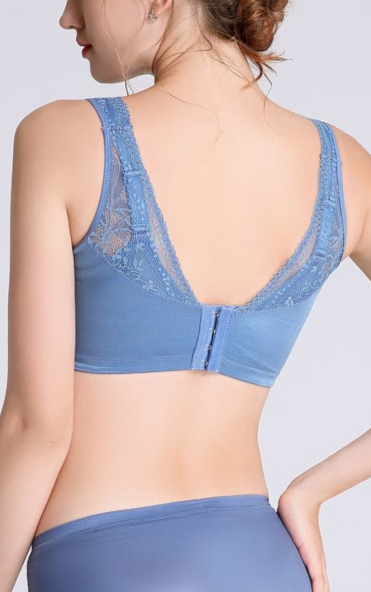 Back view of a blue lace minimizer bra featuring wide side bands and adjustable straps to smooth back fat and provide optimal fit.