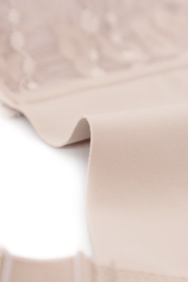 Close-up view of the Intelligent Curve Italian fabric, highlighting the luxurious and breathable material used in the Charming Beauty Push-Up Bra for ultimate comfort.